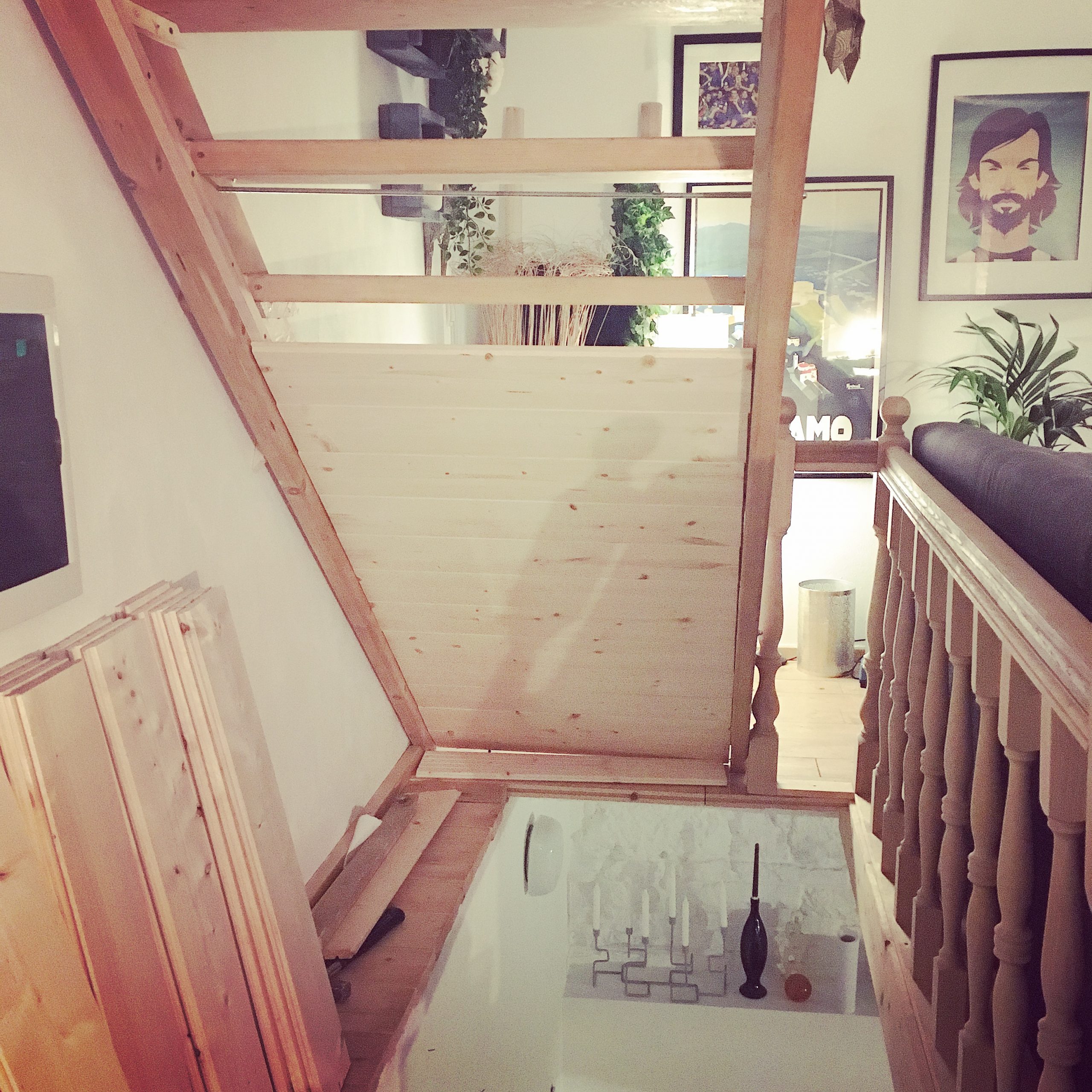 Wooden boards attached to the back of the stairs, so that they are no longer open and exposed, and are beginning to already feel a whole lot safer...